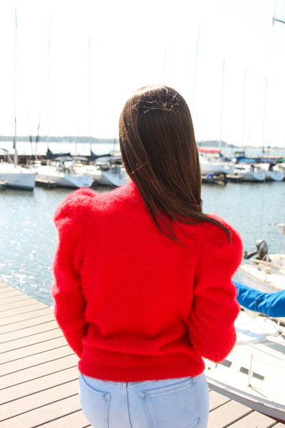 red long sleeve top