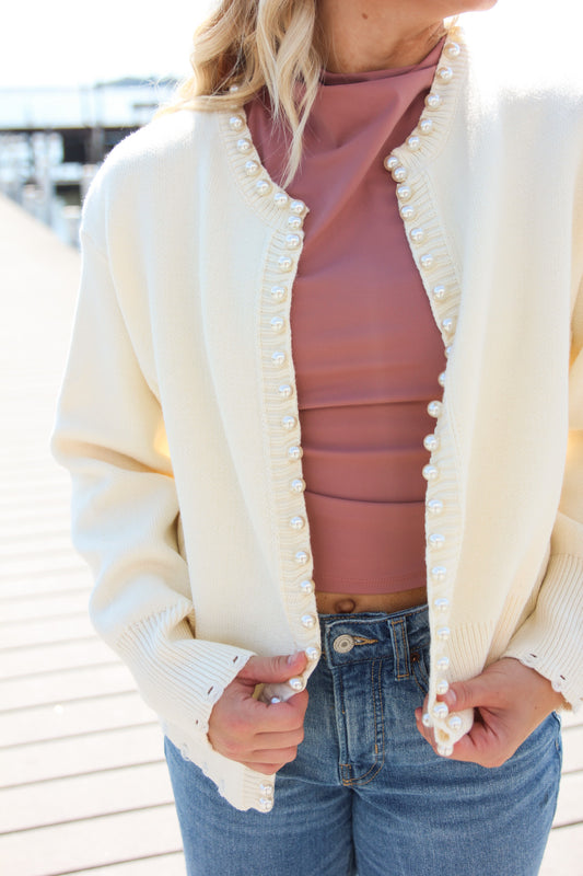 cream sweater