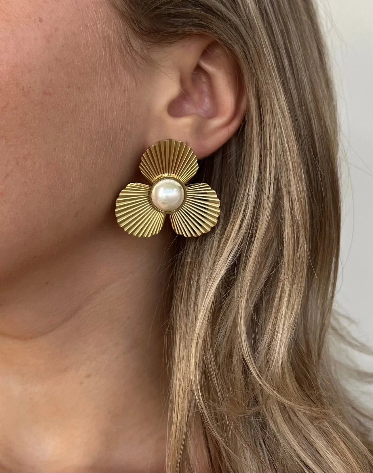 ac petals and pear studs